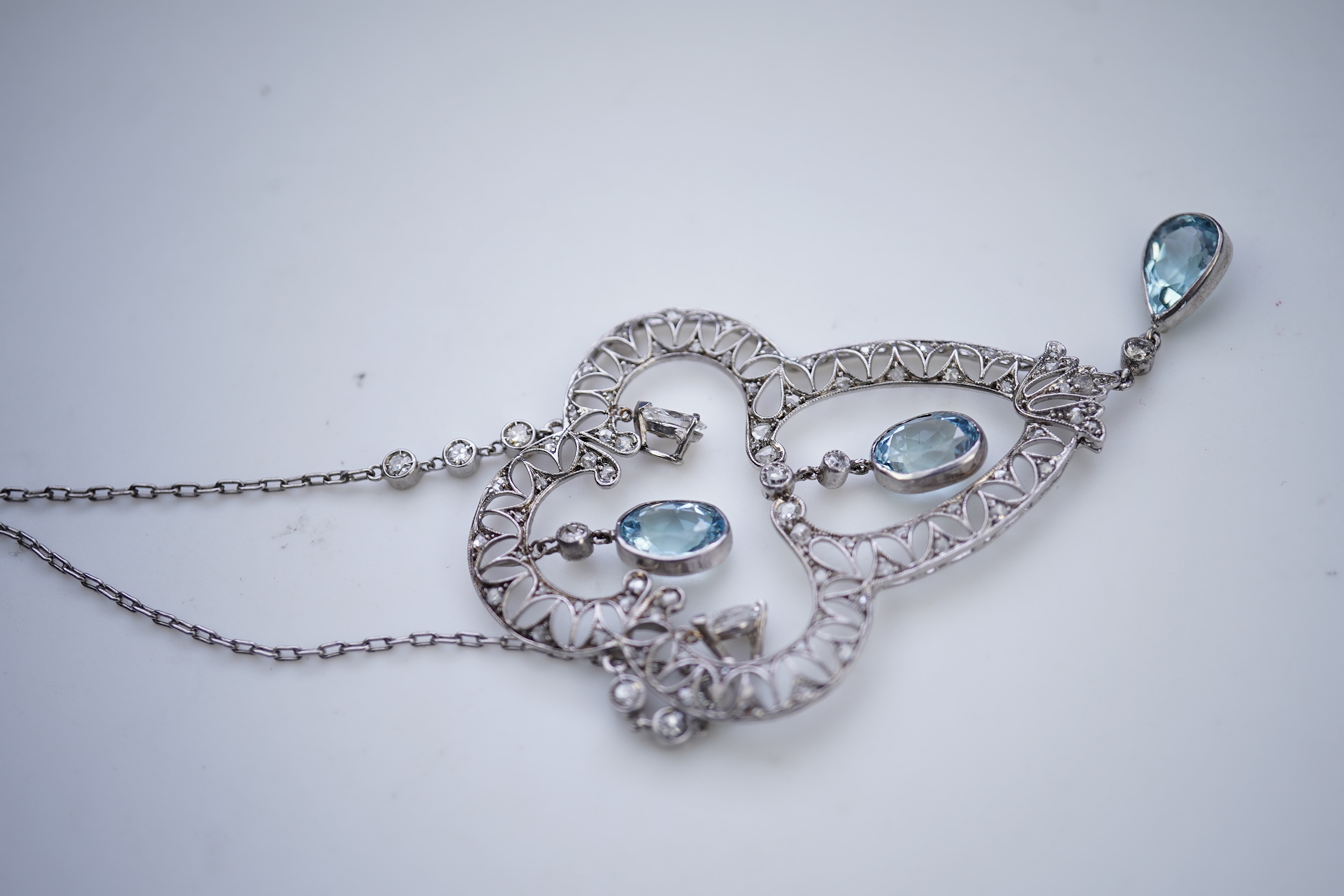 An Edwardian aquamarine and diamond pendant, circa 1910